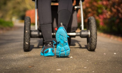 person pushing a pram